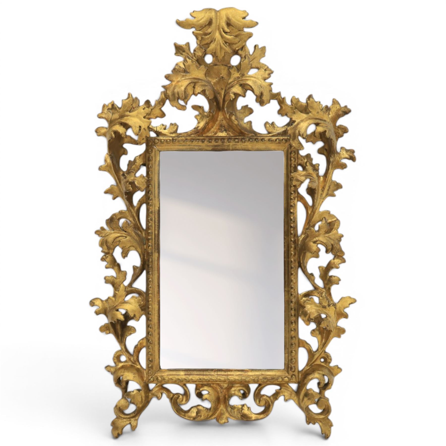 Finely carved Florentine giltwood mirror, acanthus design and egg and dart detailing, bevelled mirror plate 
