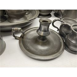 Large 18th/19th century pewter charger and a collection of other 18/19th century pewter, including pair of candlesticks, two teapots, a quantity of plates, chamberstick and mugs, charger D38cm