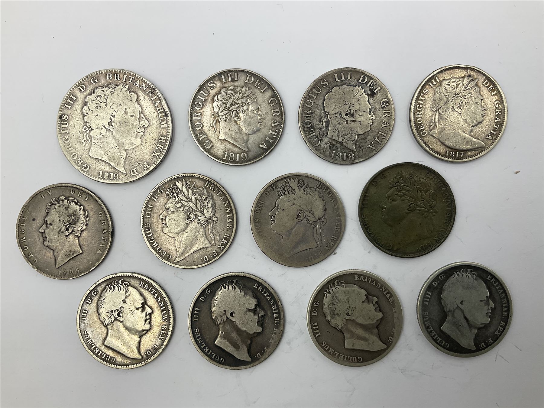 King George III 1819 silver crown coin with twelve half crowns of George III, George IIII and William IIII dated 1817, 1818, 1819, 1820, two 1823, 1825, two 1834, 1835 and 1836