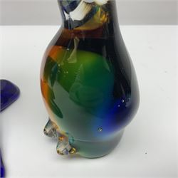 Murano glass clown, together with two glass penguin paperweights, clown H28cm