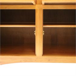 Traditional cherrywood sideboard, rectangular top above three fielded panelled drawers, three cupboard doors with triple panelled doors, brass knobs and hinges, tapered supports