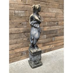 Cast stone weathered garden statue of Venus on pedestal