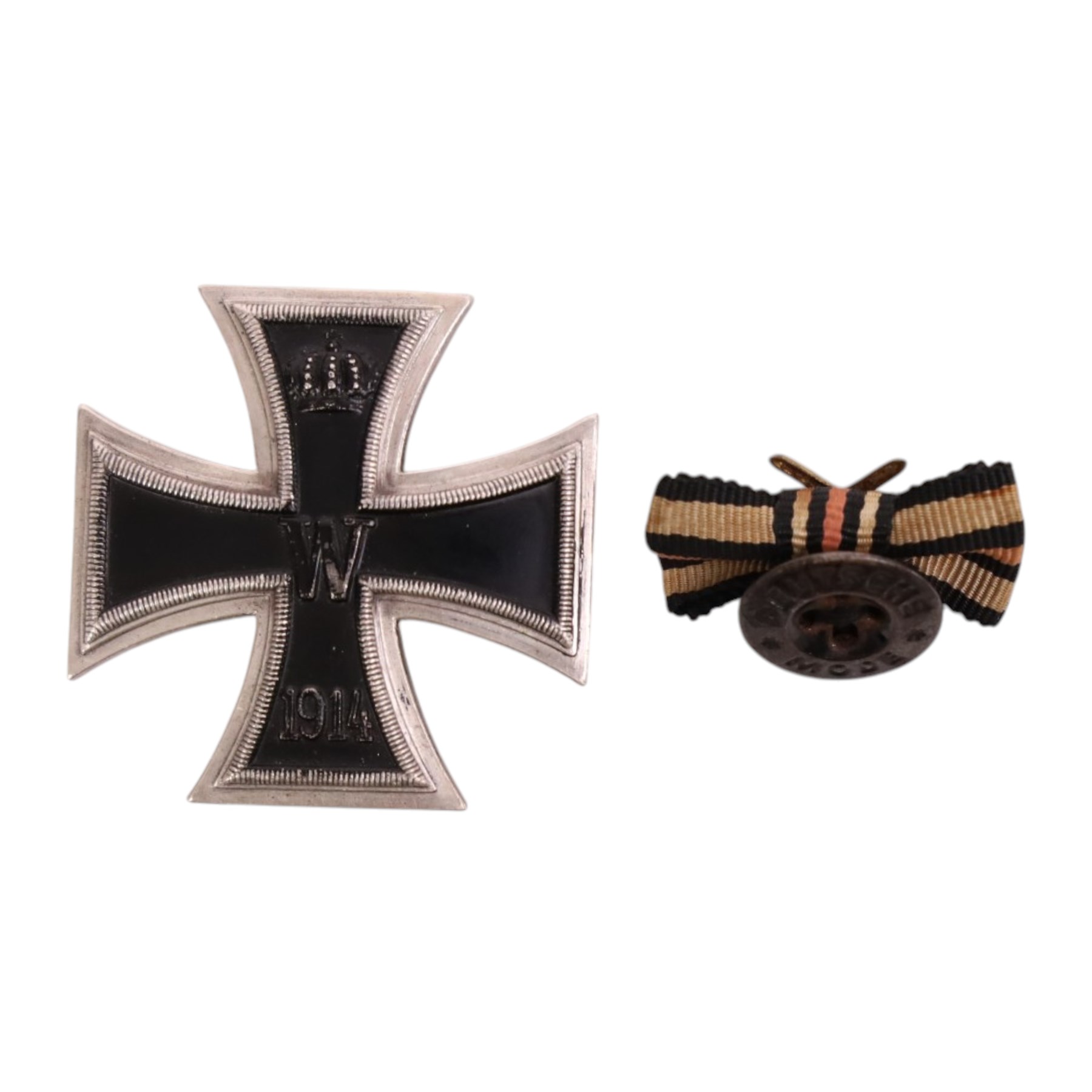 WWI three Hindenburg Cross, together with 1914 1st class iron, cross and iron cross lapel bow