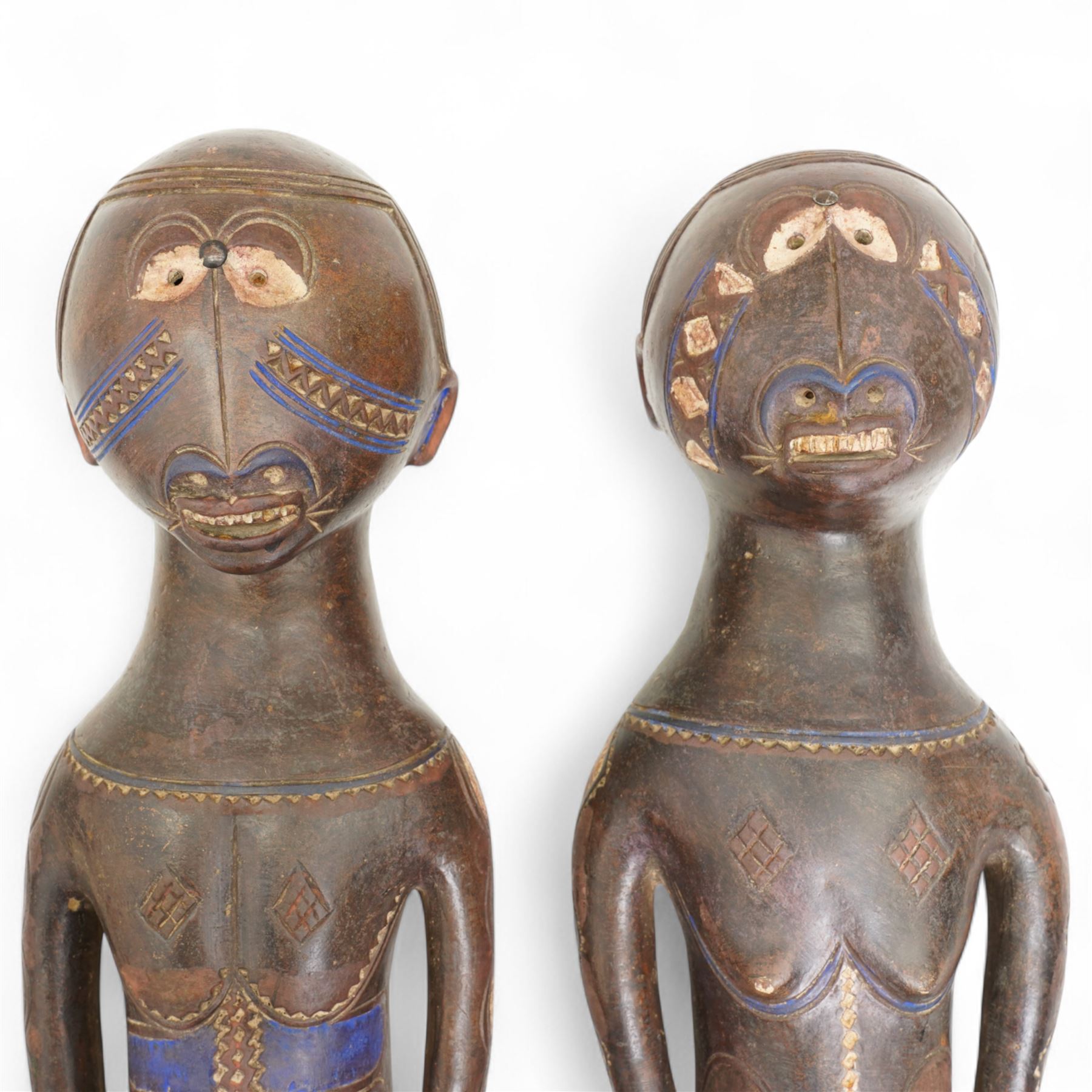 Family group of three terracotta Kouyou figures, Democratic Republic of the Congo representing father, mother and child, tallest 57cm