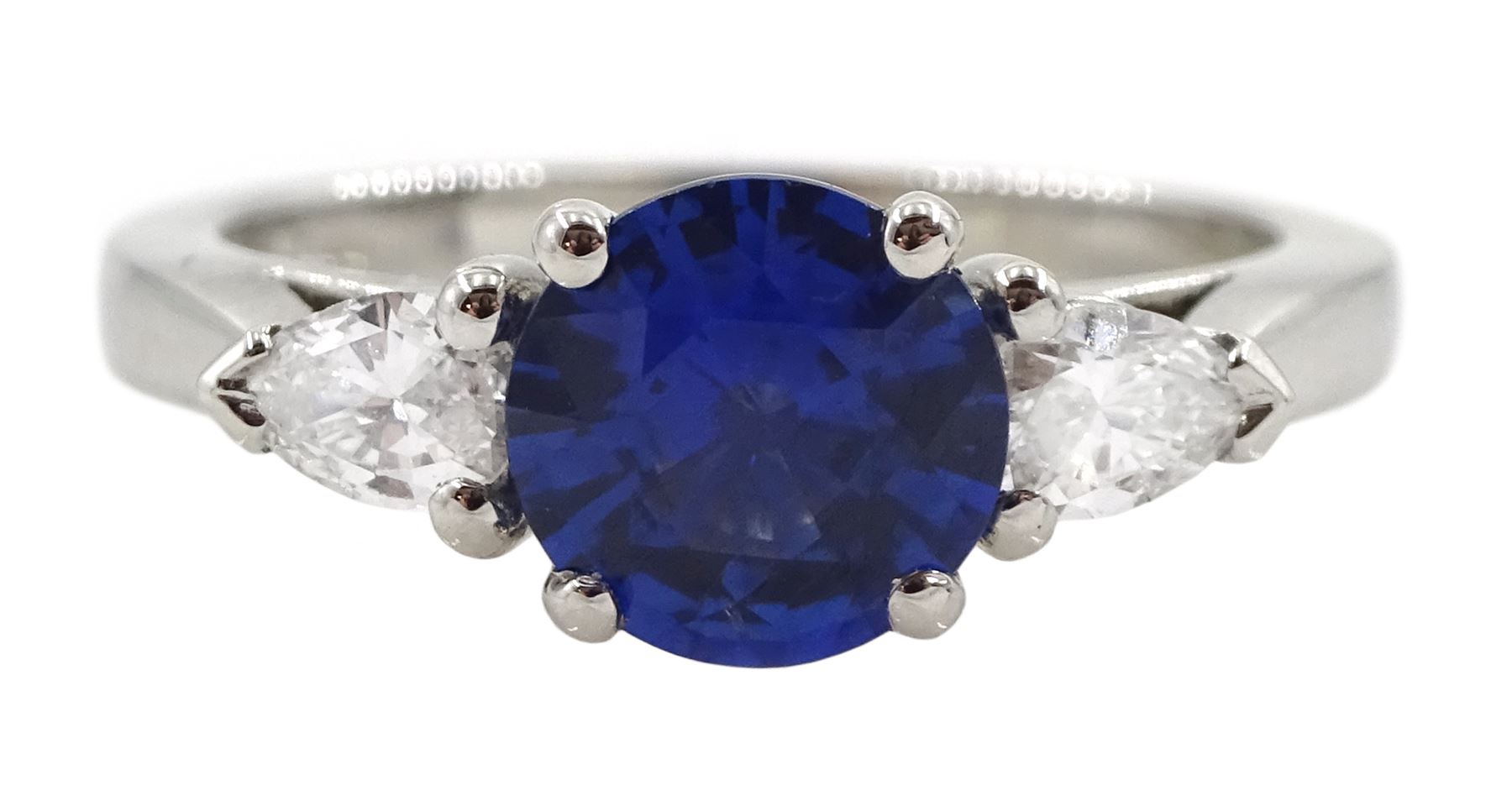 Platinum round Ceylon sapphire and pear shaped diamond three stone ring, hallmarked, sapphire approx 1.50 carat