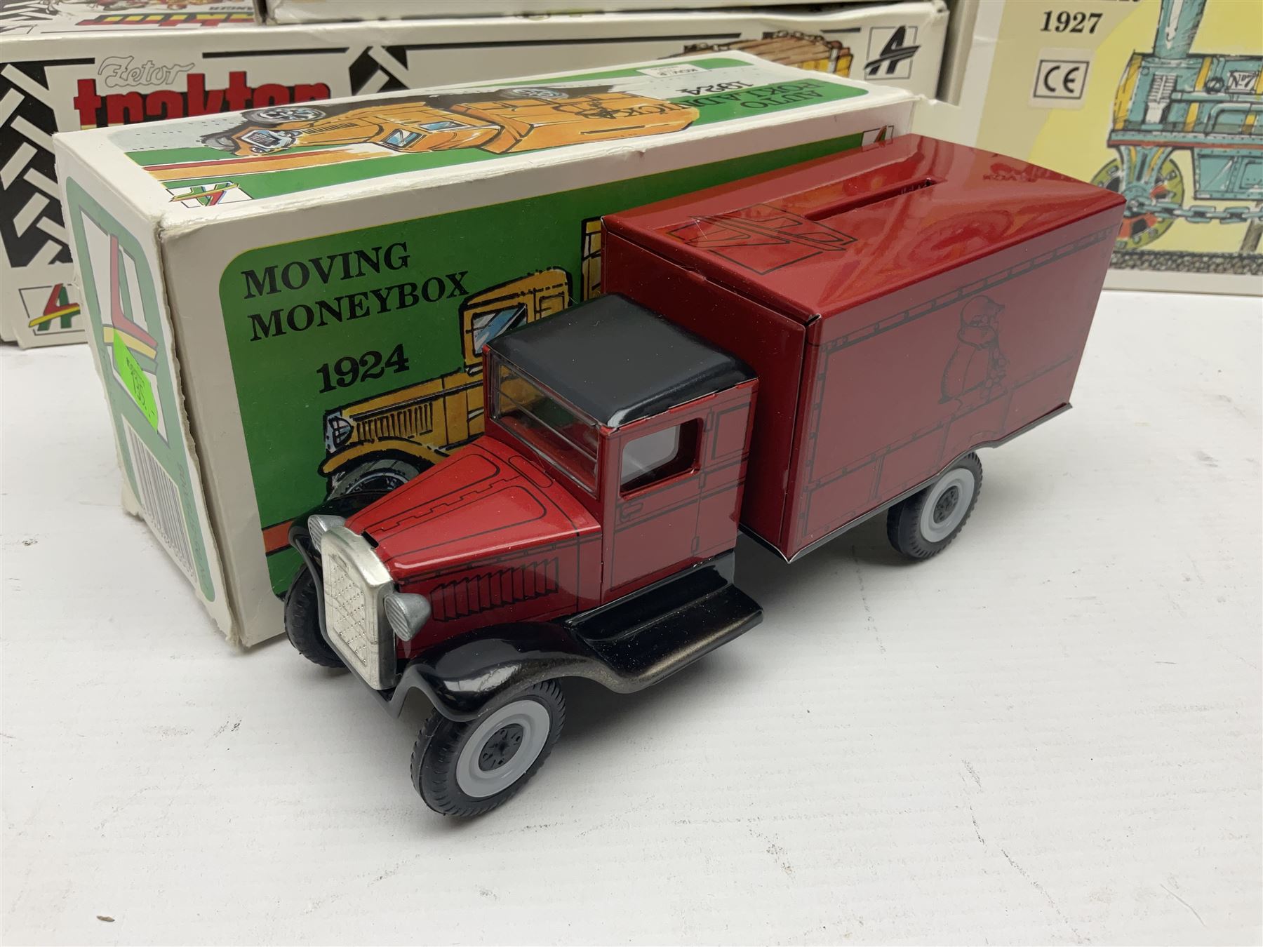 Kovap - eleven tinplate models to include Tractor and Trailer, Road Roller 1927, Moving Moneybox 1924, Hawkeye type B 1924, Boy on a Tricycle; all in original boxes 