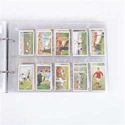 Collection of Edwardian and later Football related trading and cigarette cards, including forty-nine of fifty 1906 Ogden's Football Club Colours, 1922 PALS Footall series, ninety of one hundred 1925 Gallaher Famous Footballers, complete set of forty-four 1926 Ogden's Captains of Association Football Clubs and Colours, complete set of fifty 1927 Players Football Caricatures by MAC,  complete set of fifty 1927 Players Football Caricatures by RIP,  complete set of fifty 1930 Players Association Cup Winners, complete set of 50 1933 Ogdens AFC Nicknames etc, housed in brown cigarette card album