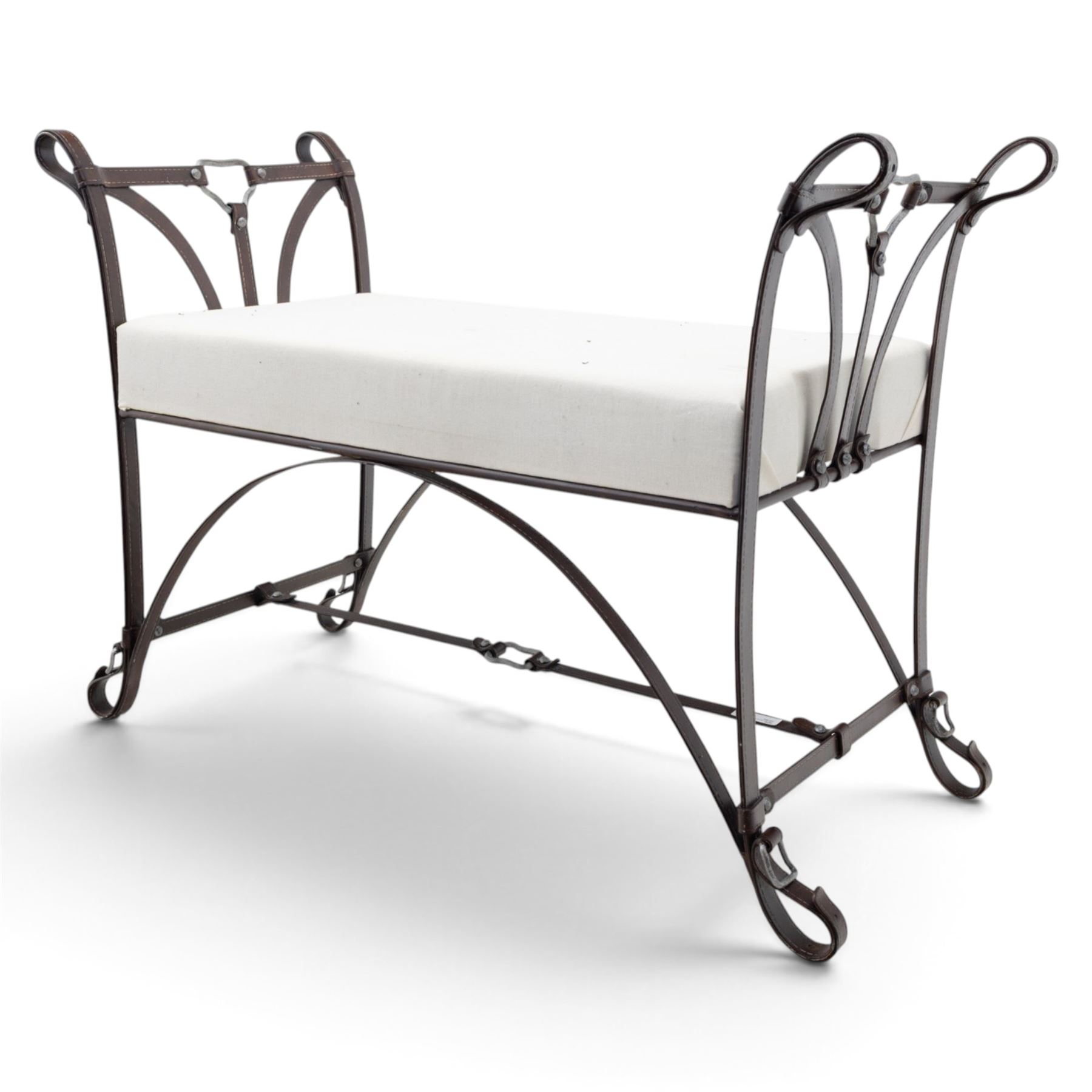 And So To Bed - 'Handel' wrought iron window seat, the rectangular upholstered seat enclosed by scrolling and arched ends with shaped uprights, on scrolling supports united by curved stretchers