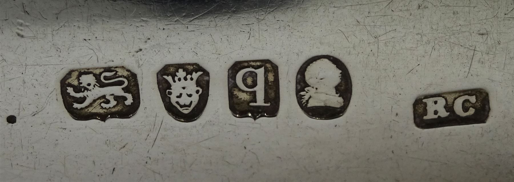 George III silver salad server by Richard Crossley, London 1791 and a George III silver basting spoon by Peter & Ann Bateman, London 1799, both Old English pattern with crest, approx 6.7oz