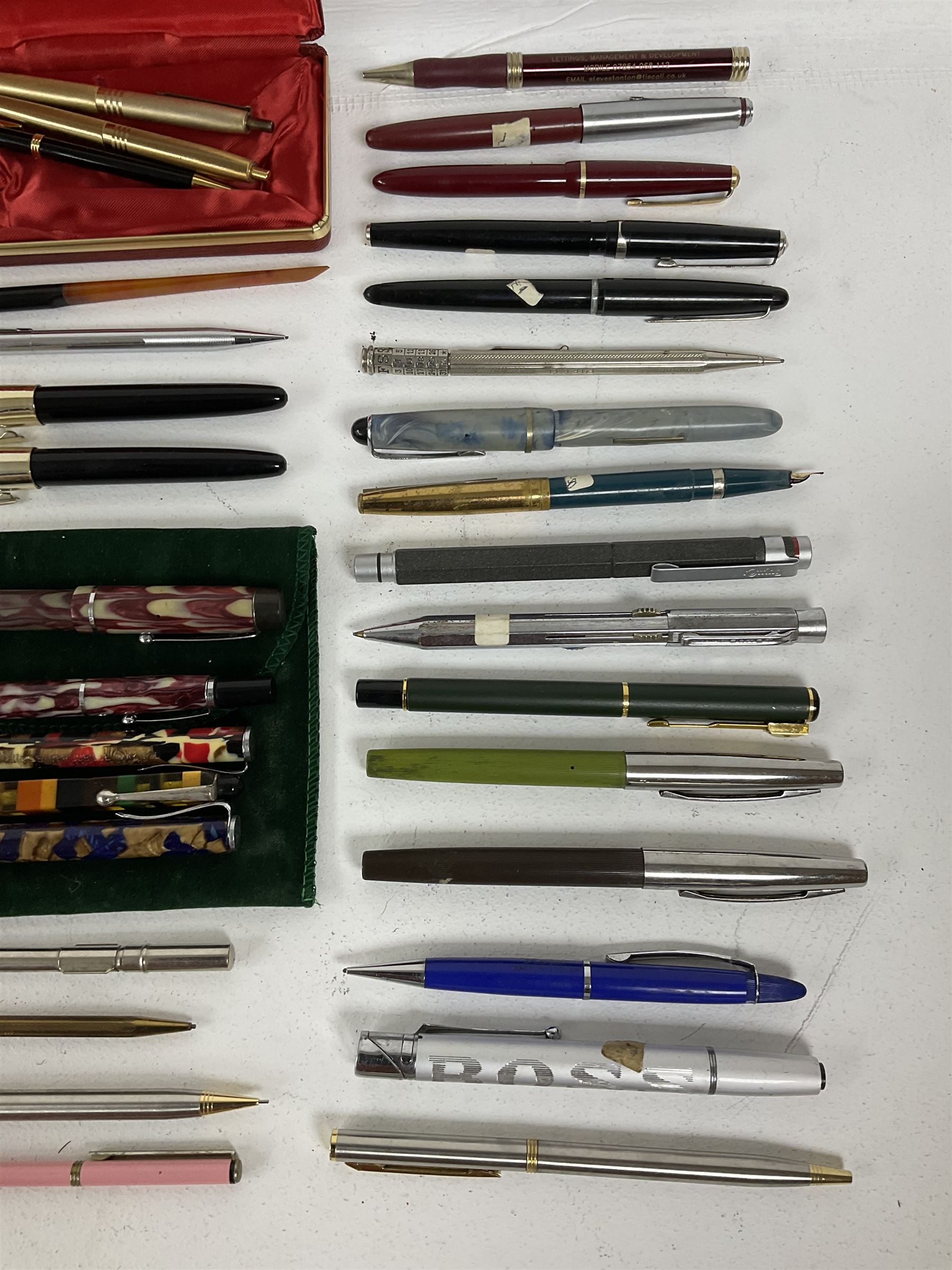 Large quantity of pens and propelling pencils, to include Rotring ballpoint pen, Osmiroid fountain pen, Parker fountain pen, Platignum ballpoint, etc, together with quantity of cases and boxes