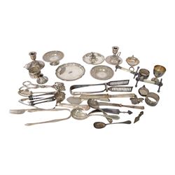 Group of silver, including sugar tongs, christening set, egg  cup, salt, strainer, silver ...