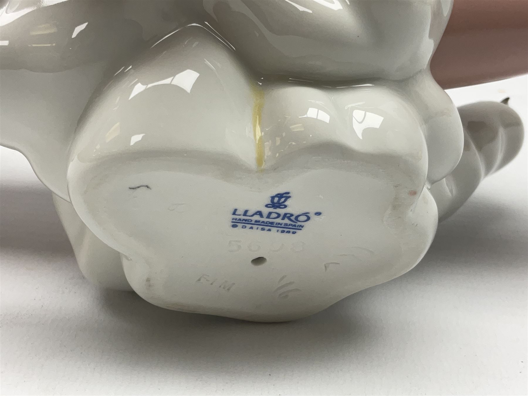 Lladro figure, Don't Look Down, modelled as a girl and boy in a plane, sculpted by Joan Coderch, no 5698, year issued 1990, year retired 2004, H17cm