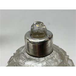 Octagonal and hobnail cut glass scent bottle of spherical form, with stopper and silver cover, hallmarked London 1912, together with a cut glass sugar sifter with silver cover, hallmarked Birmingham 1906, (2)