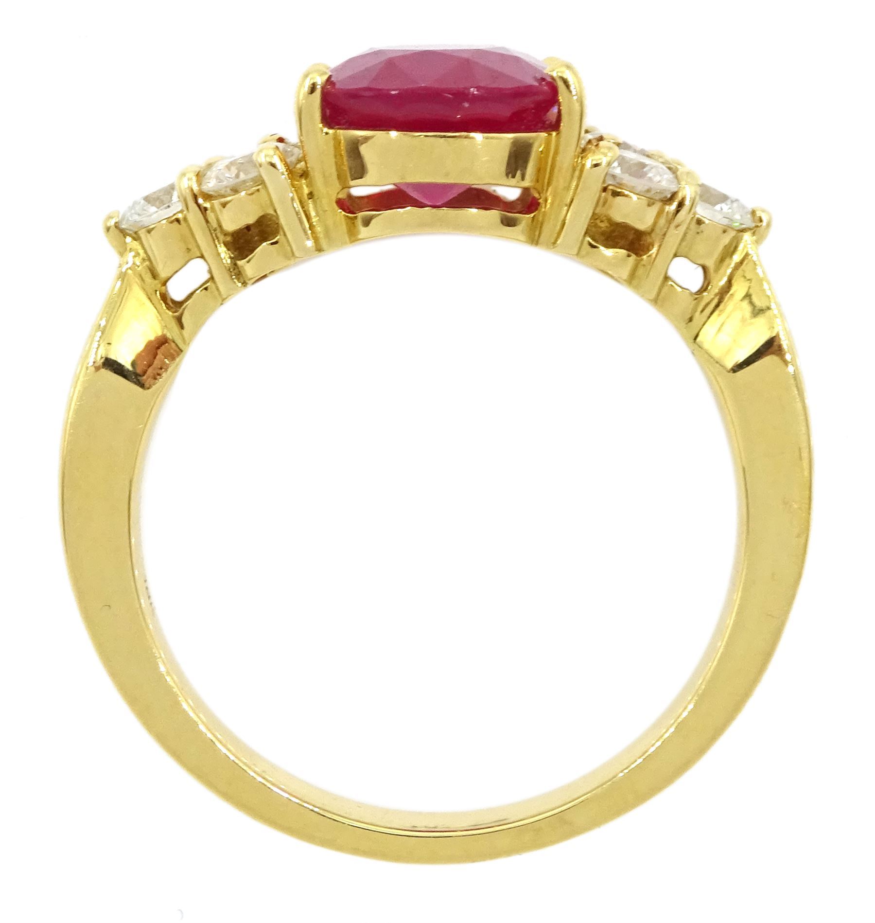 18ct gold ruby and diamond ring, single oval cut ruby of approx 5.35 carat, with three round brilliant cut diamonds set either side, stamped, total diamond weight approx 1.00 carat