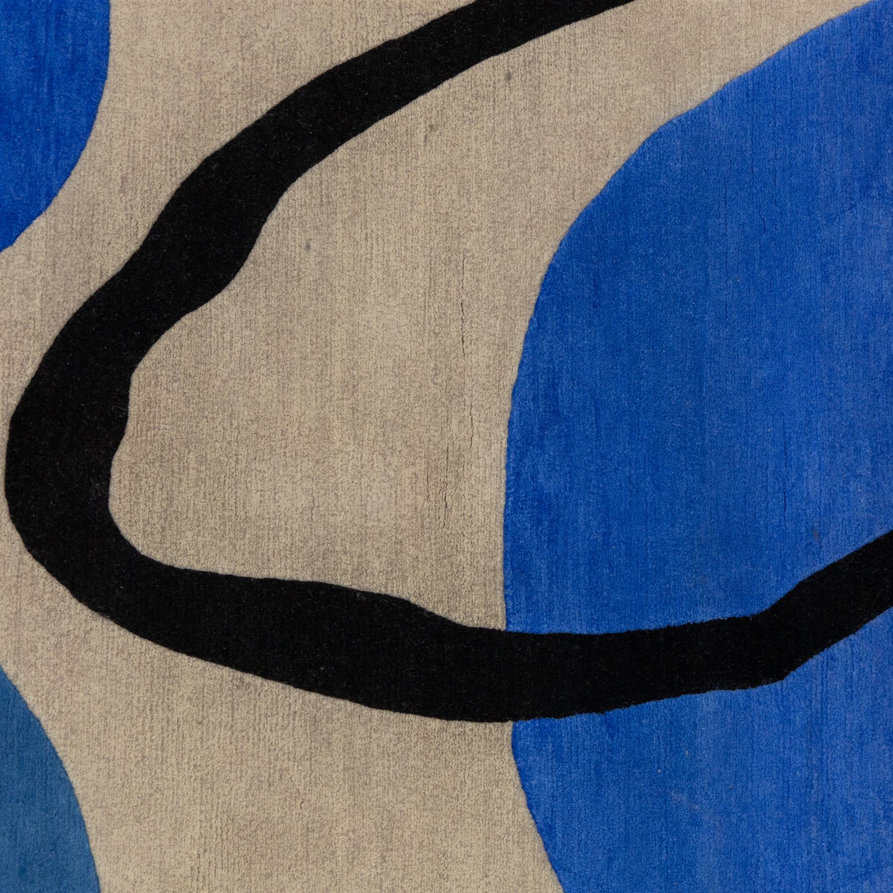 Rugs by Design - ‘Soft Landing’ Nepalese thick pile wool rug, with contemporary abstract design on a taupe ground, decorated with rounded blue forms and a bold black irregular loop motif