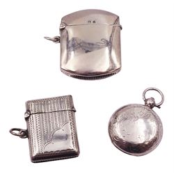 Early 20th century silver sovereign case, of circular form with engraved foliate decoration, the interior with engine turned sprung platform, hallmarked W H Haseler Ltd, Birmingham 1911, together with two Edwardian silver vesta cases, the larger example of plain curved form, hallmarked Birmingham 1909, makers mark worn and indistinct, the smaller with engraved banded decoration, hallmarked Birmingham 1907, makers mark indistinct, approximate total weight 1.99 ozt (62 grams)