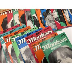Monkees memorabilia - 'Monkees Monthly' magazine almost complete run from No.1 Feb 67 to No.31 Aug 69 (lacking nos.29 and 32); the cover of No.1 signed by all four members of the group during their 1997 Reunion Tour; quantity of A&BC bubble gum cards; programme for their only UK live performance in 1967 at Empire Pool Wembley; and other related late 1960s music magazines/paperback book