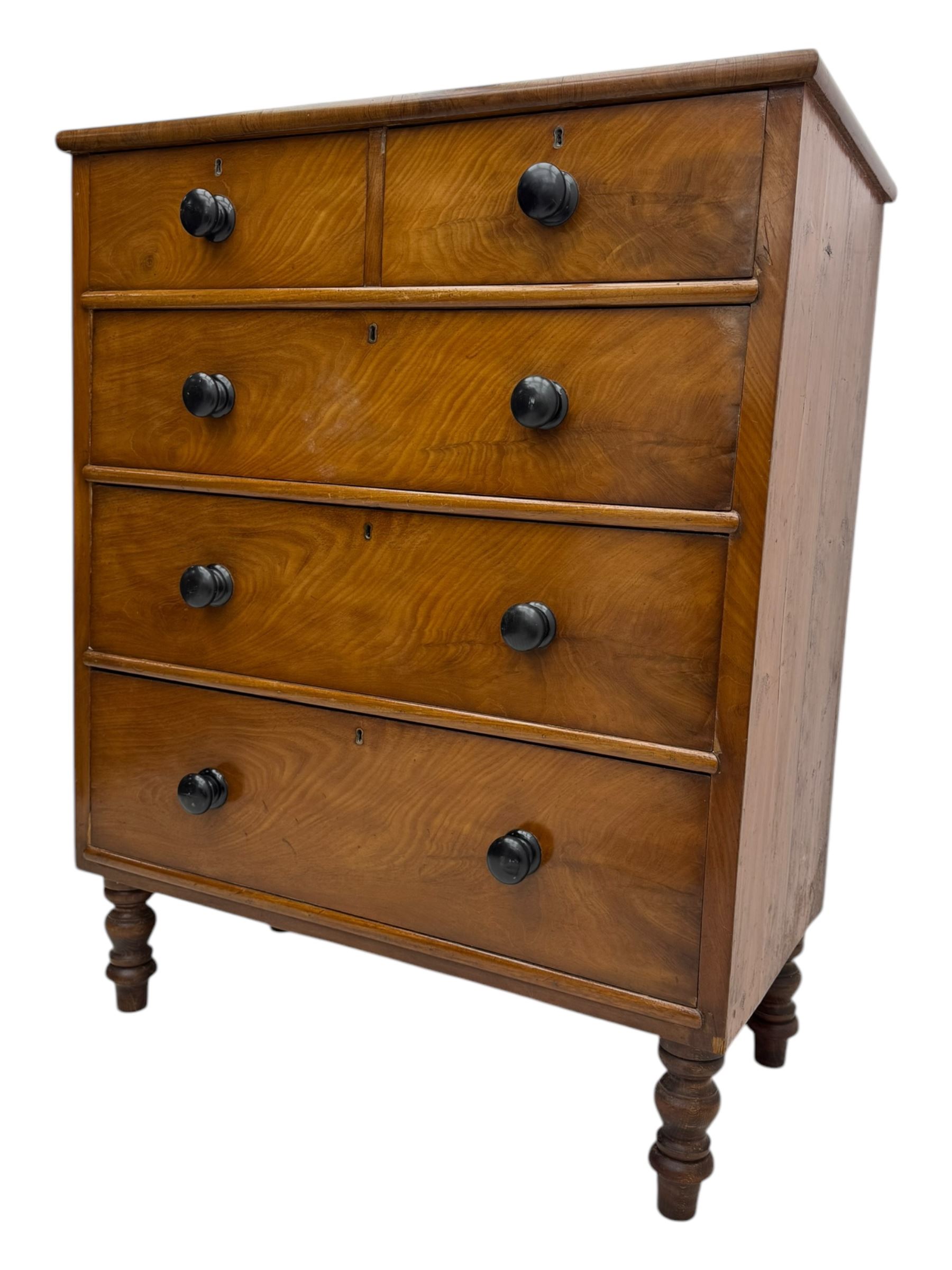 Late Victorian mahogany chest of drawers, with rectangular top over two short and three long graduated drawers, each fitted with ebonised turned knob handles and keyholes, raised on turned supports