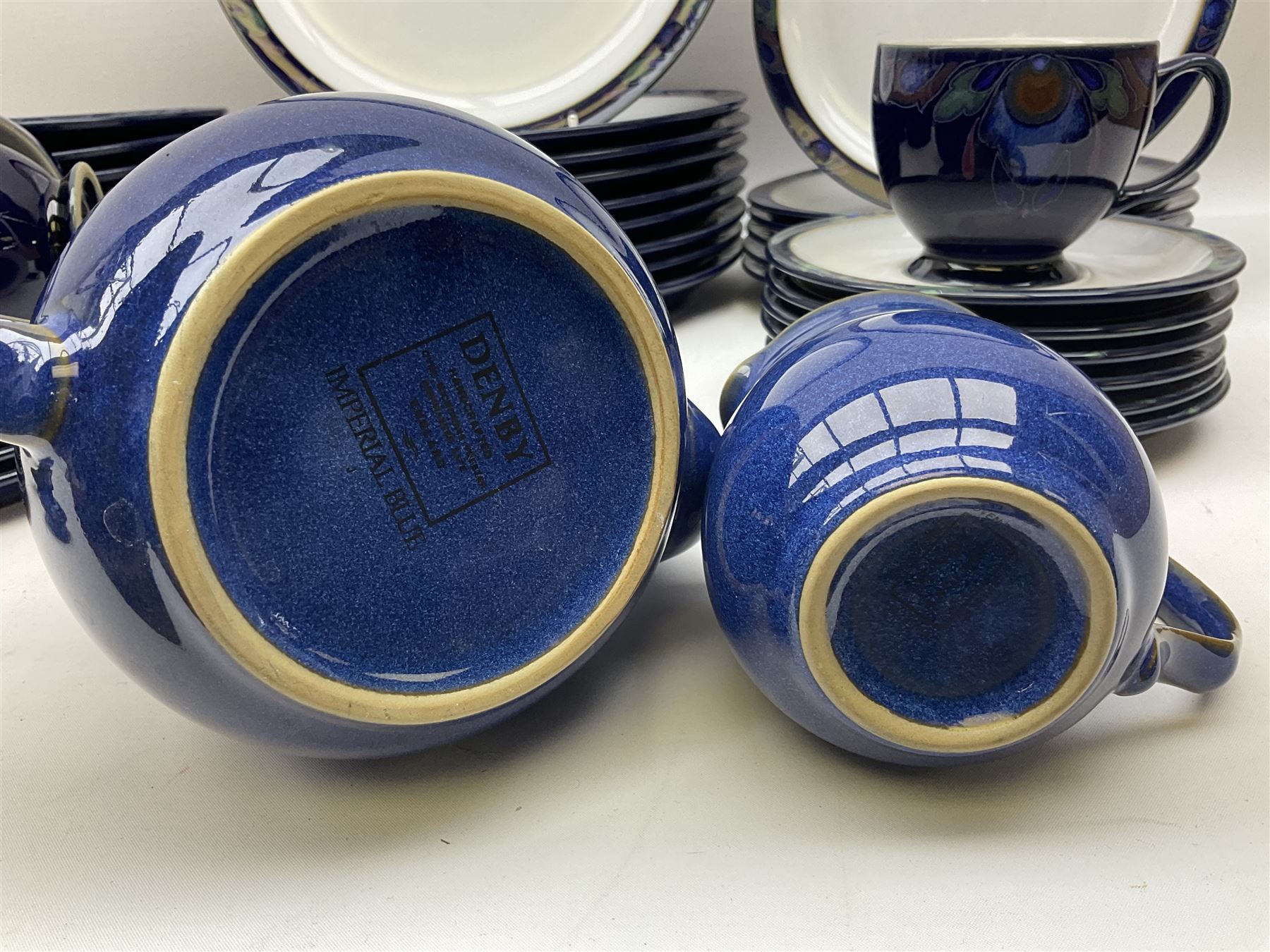Denby Baroque pattern part tea and dinner service, comprising nine dinner plates, six side plates, six bowls five dessert plates, six cups and saucers, together with a Denby teapot and jug in Imperial blue pattern