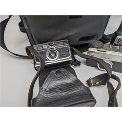 Canon EOS 650 camera, serial no 2122736, in carry case with some accessories, together with an Olympus XA2 camera and ten Kodak Instamatic cameras and two similar