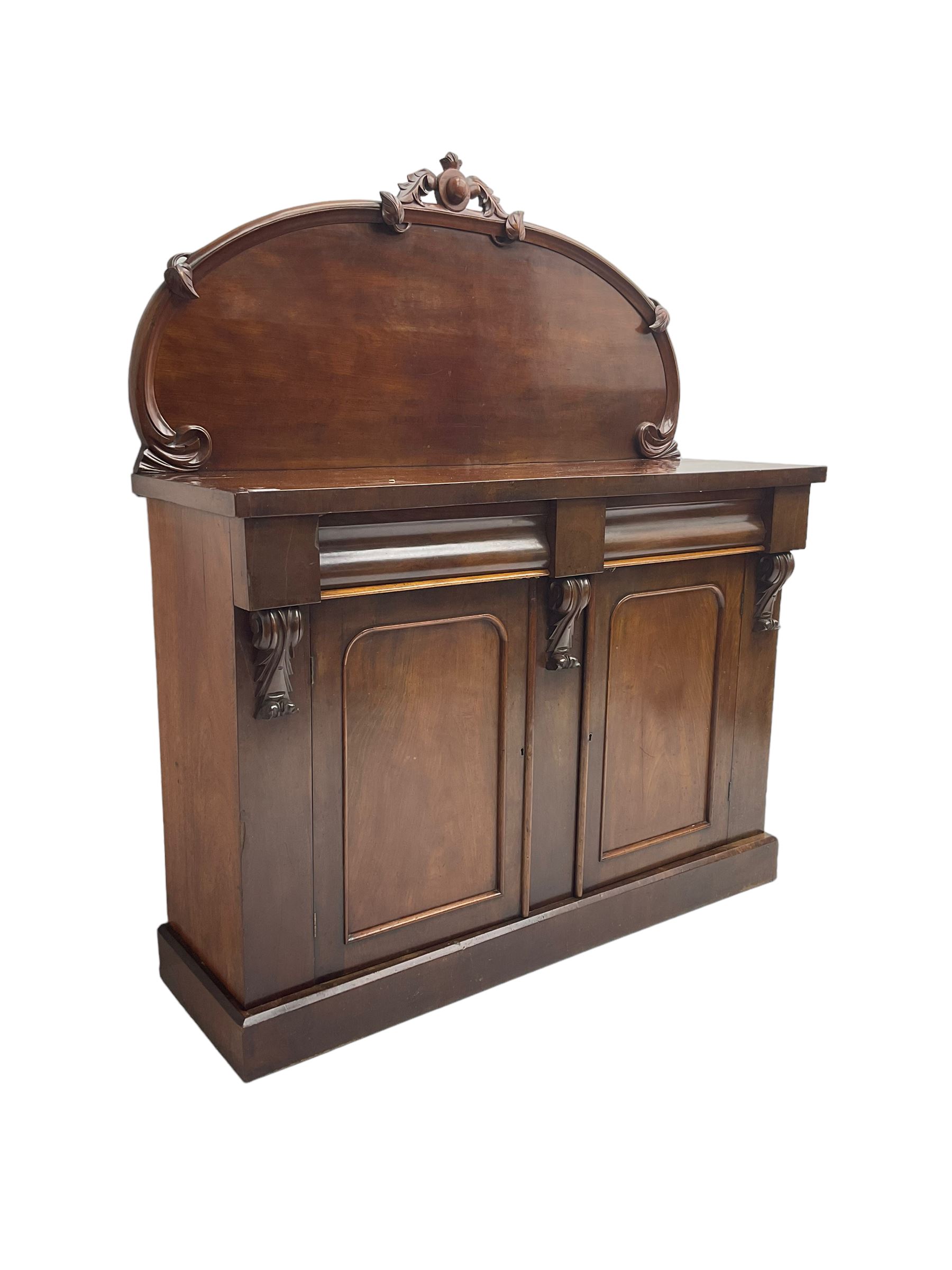 Victorian mahogany chiffonier sideboard, raised back with central cartouche pediment, fitted with two two drawers over two panelled cupboards, flanked by foliate corbels