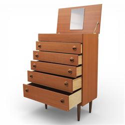 Mid 20th century teak dressing chest, rectangular top hinged to reveal a fitted interior with divisions and a rectangular mirror to the underside, over five long drawers with recessed circular handles, raised on tapering supports