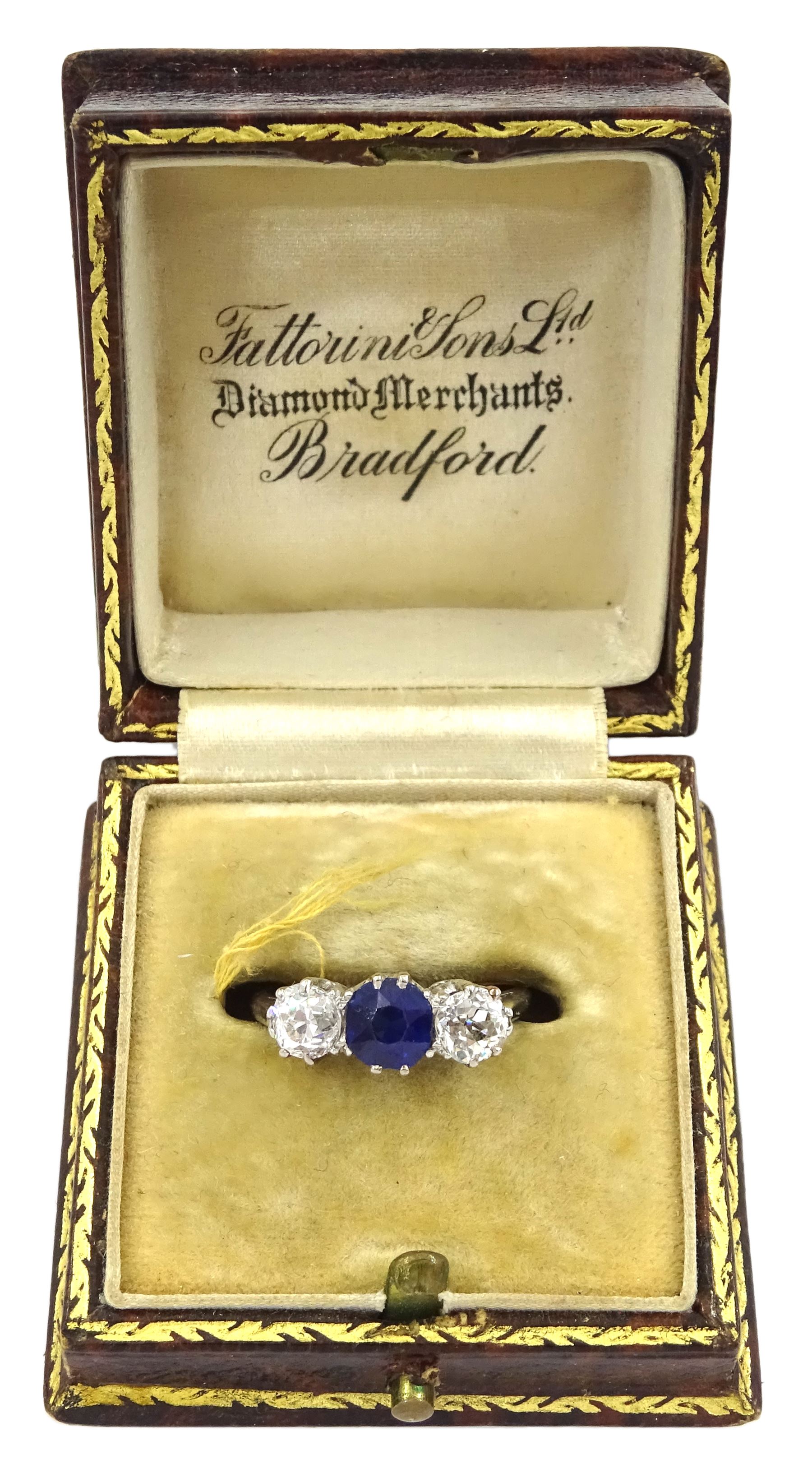 Early 20th century gold three stone old cut diamond and round sapphire ring, sapphire approx 0.60 carat, total diamond weight approx 1.00 carat