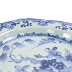 Two 18th century Chinese blue and white plates, comprising octagonal example with figural scene to centre and a larger circular example decorated with a garden scene, largest D27.5cm