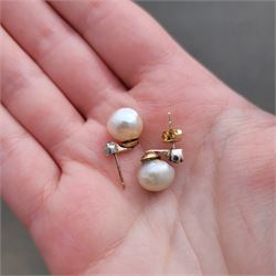 Pair of 19th / early 20th century natural saltwater pearl and diamond earrings, one stud set with a single white / cream pearl, the other with a white / grey / cream pearl, each suspending from a single old cut diamond, total pearl weight approx 4.30 carat