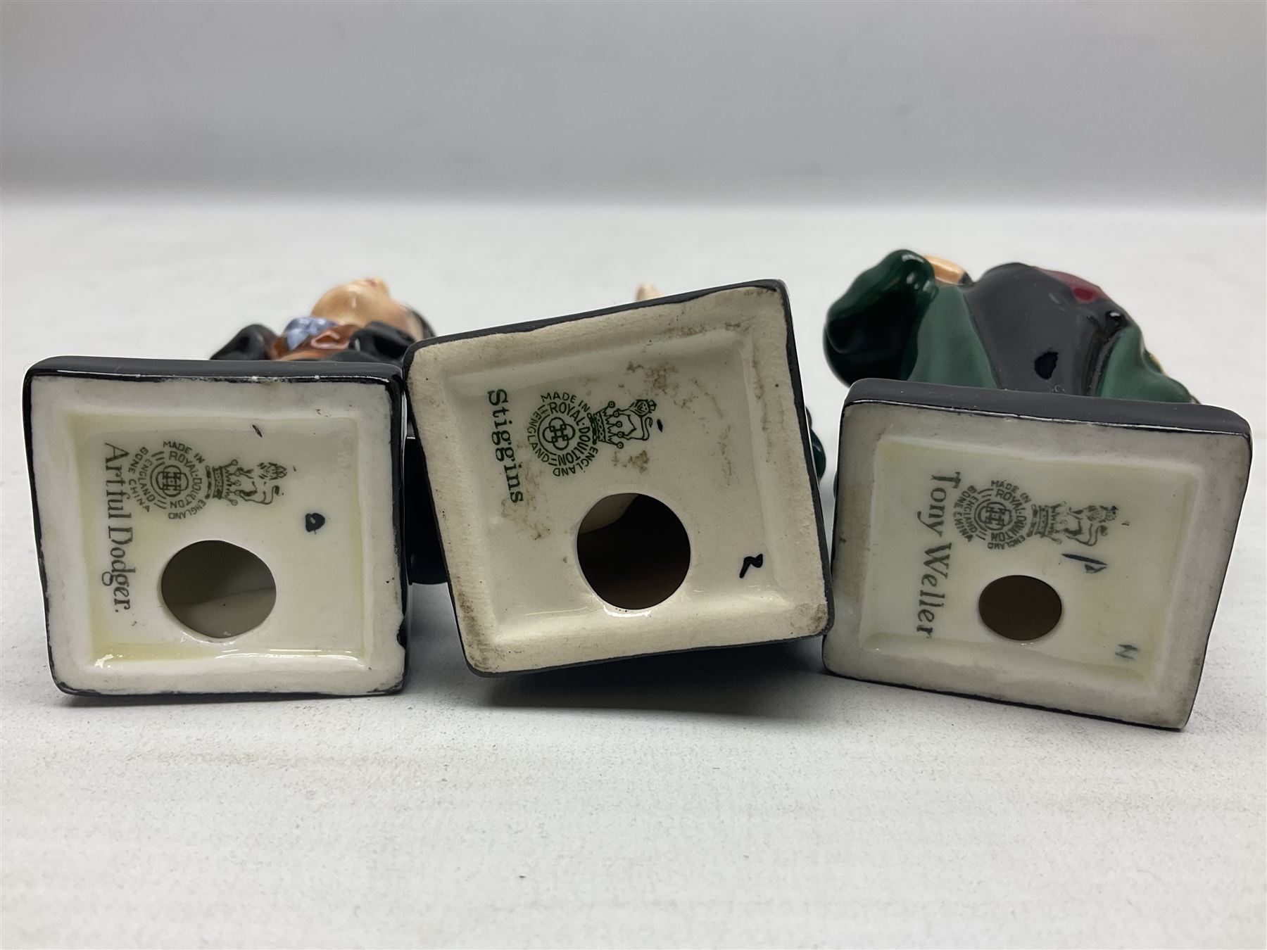 Sixteen Royal Doulton Charles Dickens figures, to include Oliver Twist, Fat Boy, Fagan, Stiggins etc, all with printed marks beneath