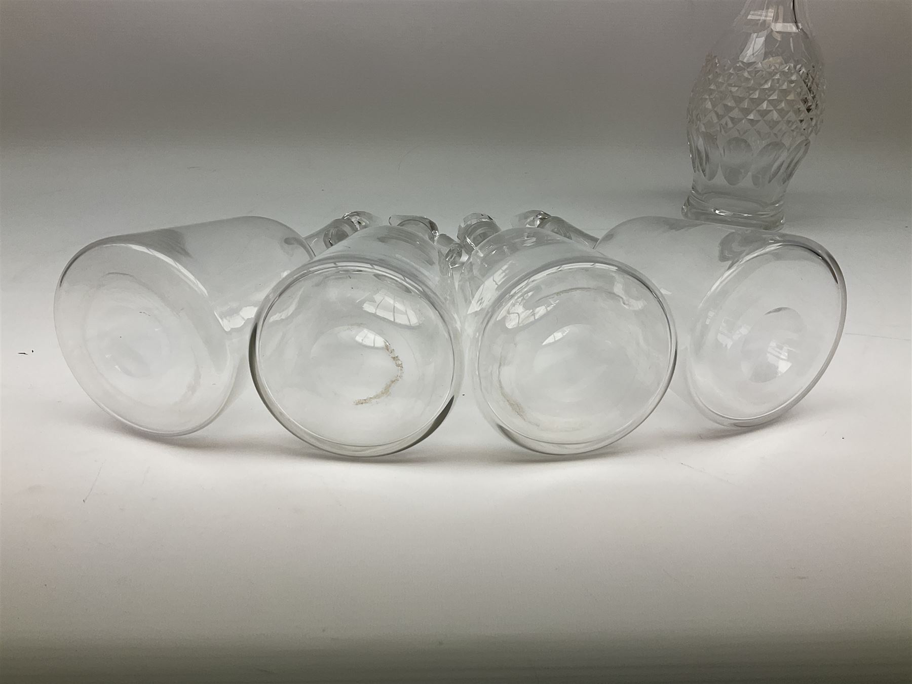 Waterford Crystal Coleen pattern cut glass decanter, together with a set of four plain mallet shaped decanters, and a further decanter of flask form, (6)