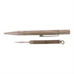 Silver propelling pencil and tooth pick, both with engine turned decoration, hallmarked