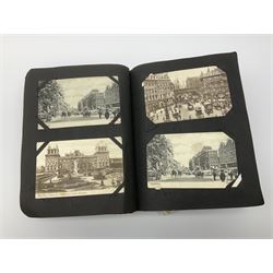 An early 20th century suede leather album, containing large quantity of Edwardian and later postcards, including a Louis Wain Fortune Telling example, plus rail photographic, election views, street scenes, novelty pull out, shipping, etc.