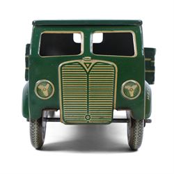 Mettoy tin plate clockwork Dunlop 90 tipper truck, in green and cream livery, H10cm, L28cm