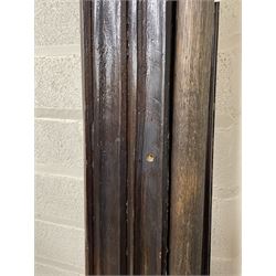 17th century style oak 4' four poster bed, high panelled back with projecting canopy cornice and panelled roof, turned posts with panelled front