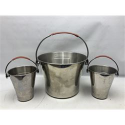 Stainless steel Laurent-Perrier champagne bucket, with engraved brass plaque and grip to swing handle, together with two matching smaller, largest D38cm (3)