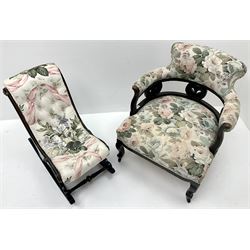 Early 20th century tub shaped armchair, painted black finish, cabriole legs, upho,steer beige ground fabric with floral fabric (W66cm) and a Victorian child’s rocking chair upholstered in a deep buttoned floral fabric (W38cm)