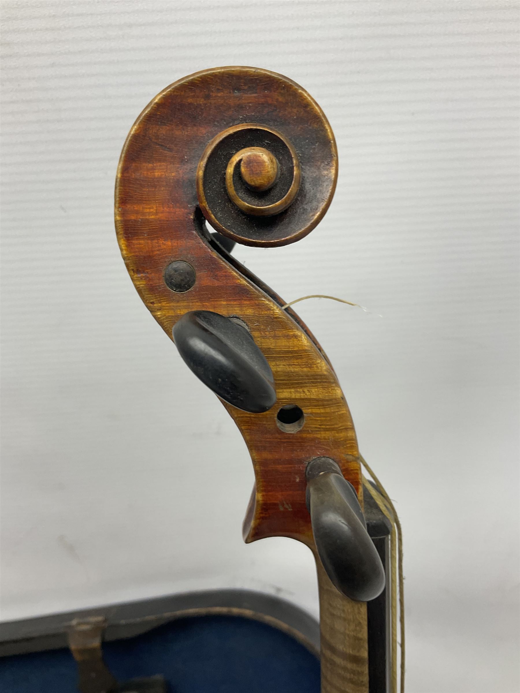 Late 19th century French three-quarter size 'Conservatory' violin with 34cm two-piece maple back and ribs and spruce top, the peg box inscribed 'Conservatory Violin Straduari', bears label 'Antonius Stradiuarius Cremonensis Faciebat Anno 1721' L55.5cm overall; in ebonised wooden 'coffin' case