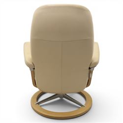 Ekornes - Stressless reclining beige leather armchair and stool, raised on brushed steel frame, light oak rotating base