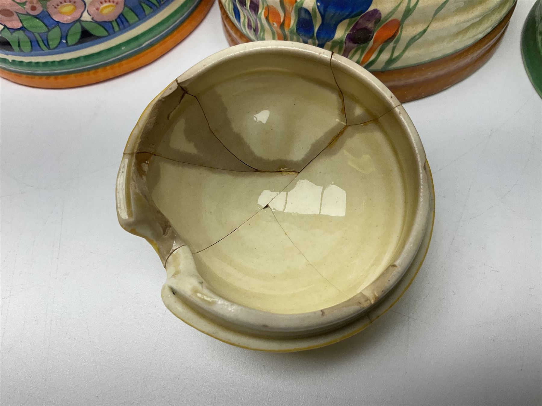 Clarice Cliff for Wilkinson Ltd Crocus Bizarre beehive honeypot painted in the Crocus pattern, together with two beehive Beswick honey pots, Poole square honey pot etc (14)