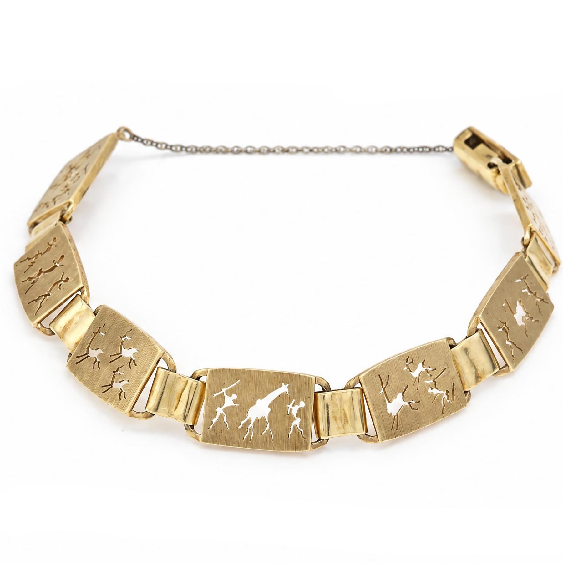 Gold seven panel bracelet, each with pierced design hunting scene decoration, stamped 9ct