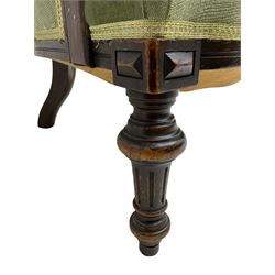 Victorian mahogany framed armchair, upholstered in buttoned sage green fabric with sprung seat, raised on turned and fluted front supports with matching arm terminal column supports