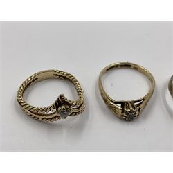 Four 9ct gold rings, to include cubic zirconia wishbone ring, single stone cubic zirconia ring and two heart design signet rings