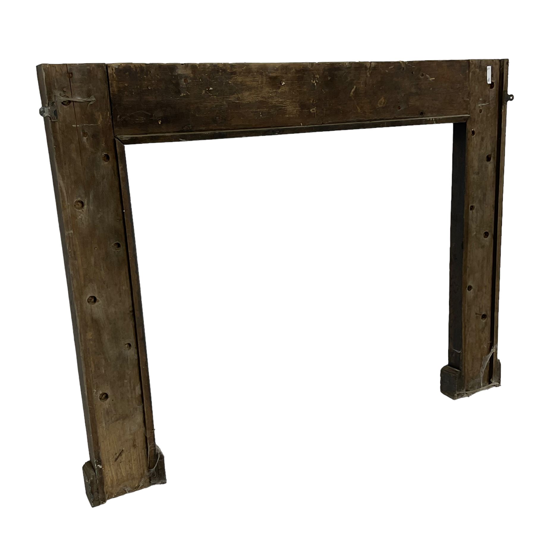 19th century Jacobean Revival oak fire surround, decorated with applied carved panels depicting foliate patterns and stylised grape vines, uprights carved with fleur-de-lis decoration