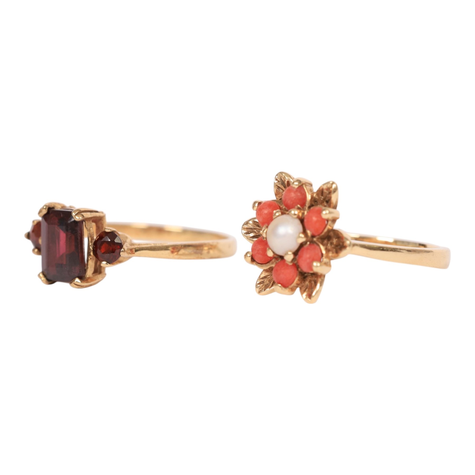 Gold coral and pearl ring and a gold three stone garnet ring, both hallmarked 9ct