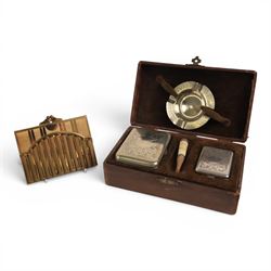 Three cigarette cases, modelled as bank notes, together with a smokers set including ashtray, cigarette case, ligher and cigarette holder, cased and other cigarette holders 