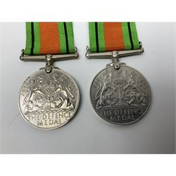 Ten WW2 medals comprising two 1939-1945 war medals, two Defence medals, two 1939-1945 Stars, two Africa Stars, France & Germany Star and Burma Star; together with bar of four miniature medals; all with ribbons