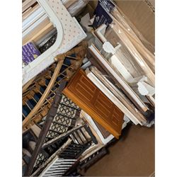 Dolls House building accessories, including three stair cases, a quantity of doors and windows, skirting board, coving, kitchen and fireplaces scenes and a collection of wired and non wired light fittings