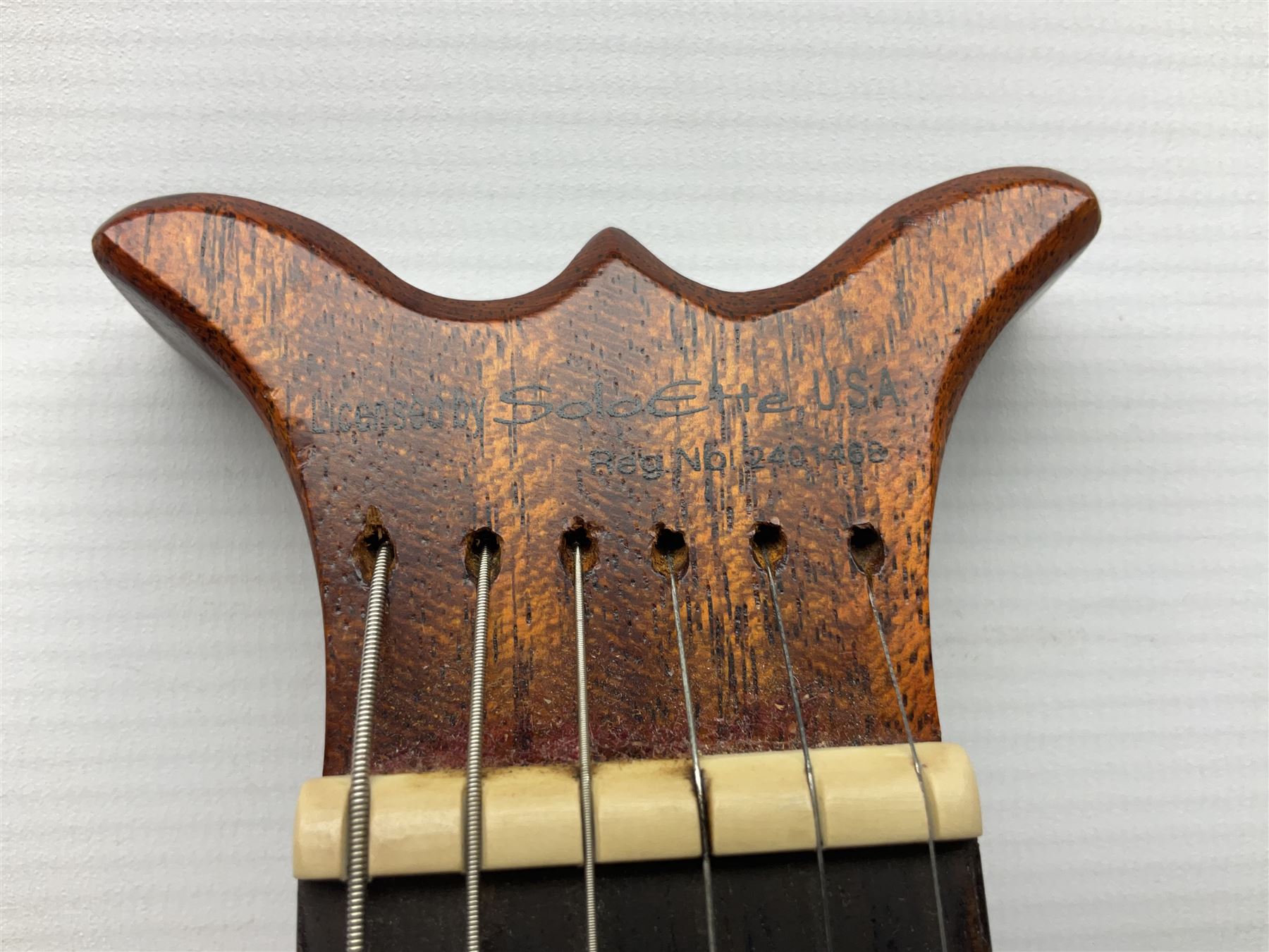 Aria Sinsonido mahogany electric travel guitar, serial no.0502385 L86cm; in original gig bag with earphones and GM11 Minituner; together with Fender Sidekick Reverb 25 amplifier and Marshall MG Series 15DFX amplifier (3)