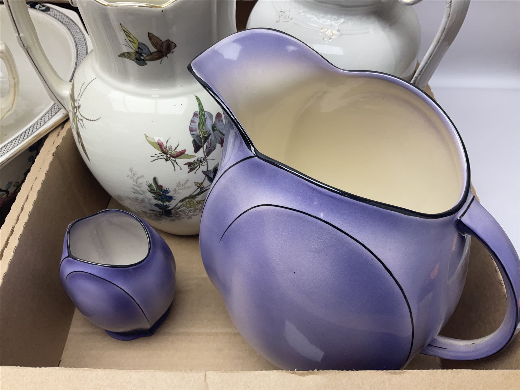Royal Winton Art Deco style wash jug and bowl, in geometric purple design, together with two other large wash jugs with bowls and other similar ceramics, in three boxes 